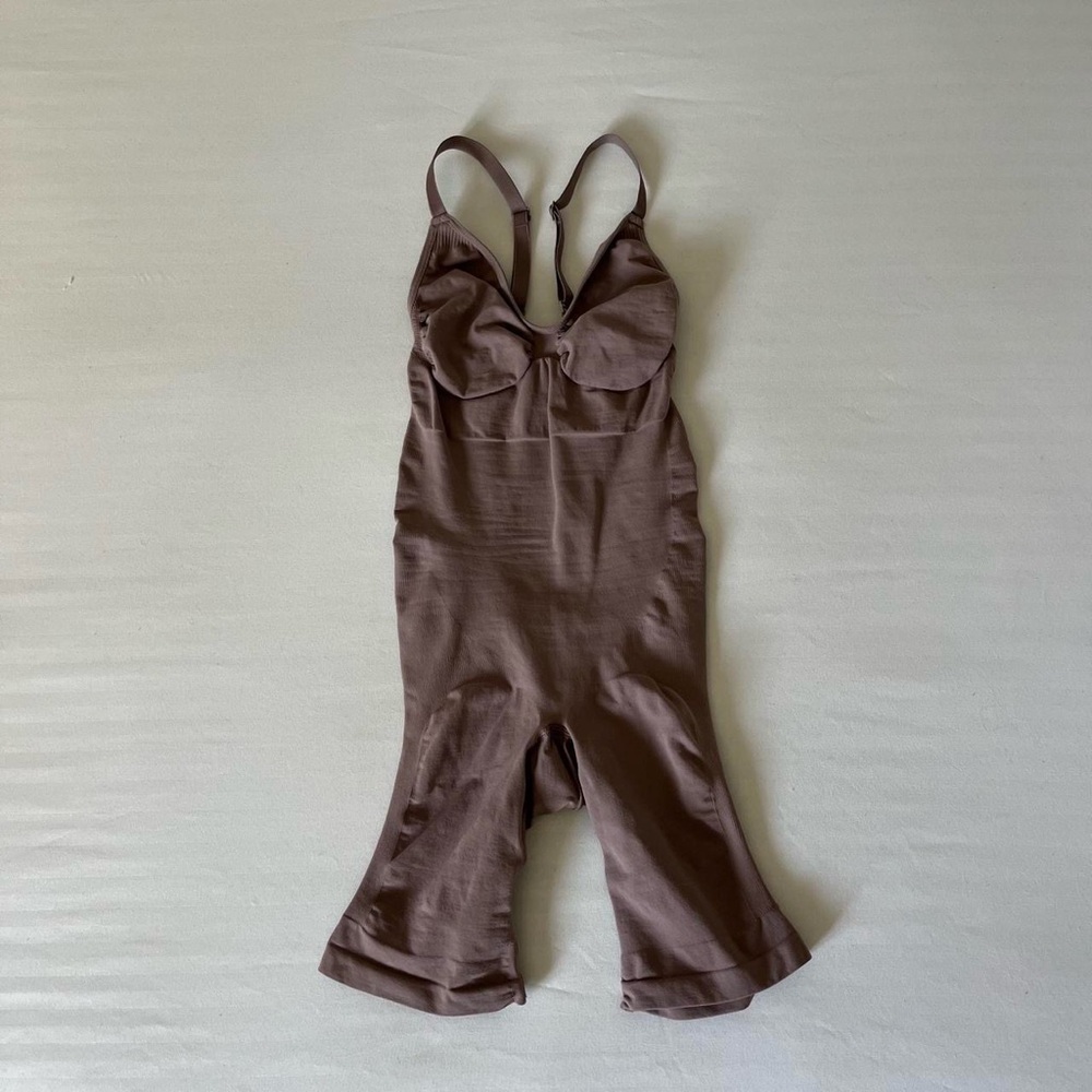 Tan Skims bodysuit shapewear with adjustable straps